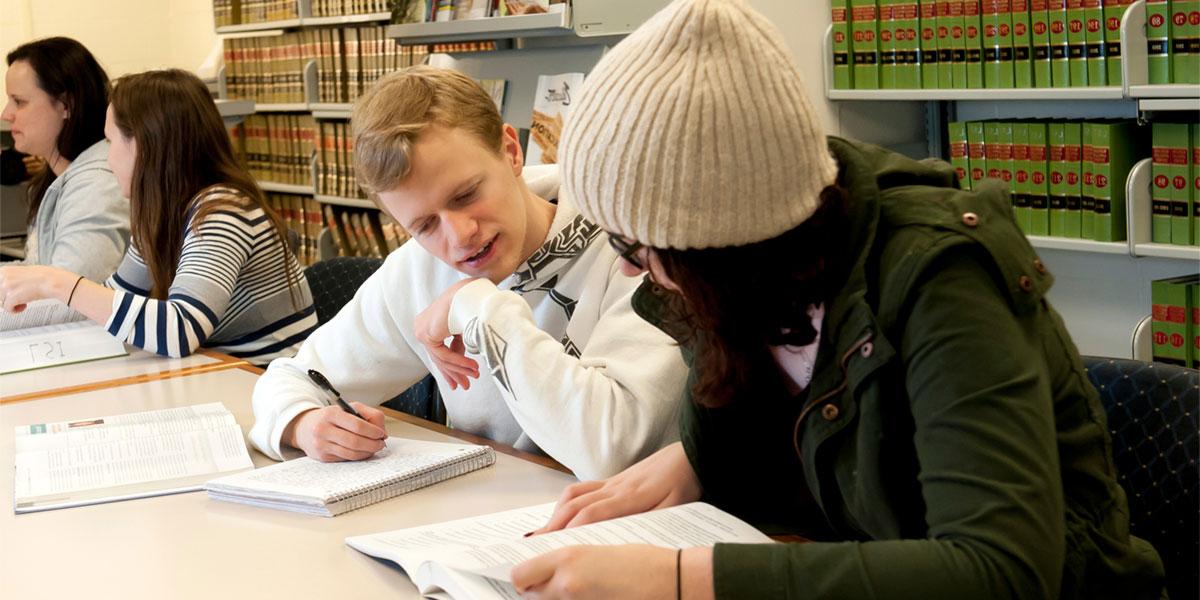 legal studies students in library